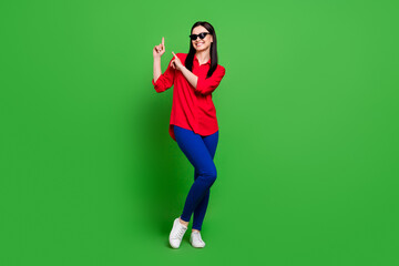 Wall Mural - Full length body size view of attractive cheerful lady dancing having fun good mood isolated over bright green color background