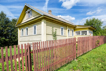 Wall Mural - Old rural wooden house in russian village in summer