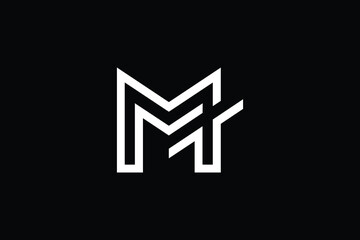 Wall Mural - TM logo letter design on luxury background. MT logo monogram initials letter concept. TM icon logo design. MT elegant and Professional letter icon design on black background. T M MT TM