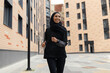 Outdoor Sports. Young Muslim Lady In Modest Sportswear Jogging On City Street