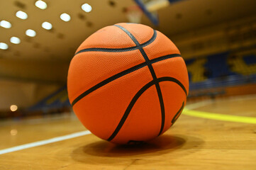 Basketball ball on the court in sport arena