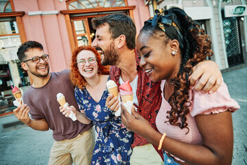 Wall Mural - having fun woman street friendship friend outdoor lifestyle city happy icecream young eating man couple