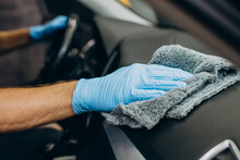 Man Wiping Car With Microfiber After Wash