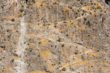 Trail switchbacks on a mountain in Tajikistan.