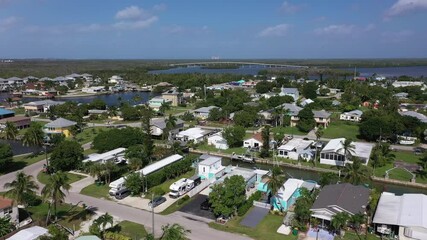 Fototapete - Goodland Florida Drone Flyover Camera Shot. Marco Island. Living in Goodland offers residents a sparse suburban feel and most residents own their homes. In Goodland there are a lot of restaurants
