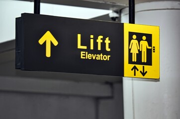 elevator sign at airport terminal