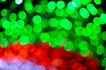 Wall Mural - Defocused Red, white and Green abstract bokeh lights background.