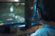 © StockPhotoPro - Young gamer playing online video games