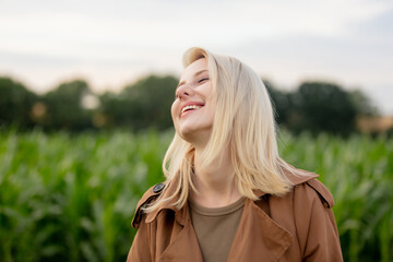 Sticker - Blonde woman in cloak in cornfield in summertime