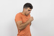 ©  Yistocking - a young boy coughing because he is sick on a white background.