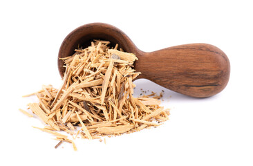 Muira Puama herbal tea in wooden spoon, isolated on white background. Natural potency wood, medicinal plant, dry tea. Ptychopetalum olacoides.