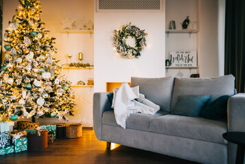 Canvas Print - Scandinavian Christmas interior in living room with Christmas tree in the evening.