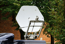Portable Satellite Dish For Live TV Broadcasting. TV Company Equipment Installed On The Car. Close-up