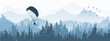 © Anna - Horizontal banner. Magical misty landscape with paraglider and birds. Silhouettes of trees and mountains. Blue illustration.