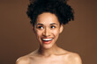© speed300 - Portrait view of young charming multiracial lady with perfect skin standing and looking away with happy emotion in studio. Beauty, facial treatment and spa concept
