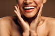 © speed300 - Cropped view of the overjoyed multiracial brunette girl with perfect skin and nude makeup smiling toothy while posing over brown studio background