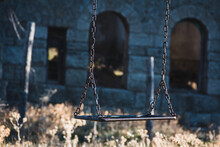Old Swing In Abandoned House. Selective Focus.