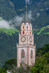 Wall Mural - View of Merano in South Tyrol with the parish church of St. Nicholas from the 14th and 15th centuries - Italy.