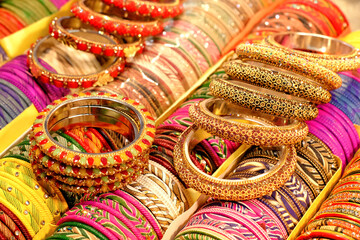 Wall Mural - Indian colorful bangles displayed in local shop in a market of Pune, India, These bangles are made of Glass used as beauty accessories by Indian women.