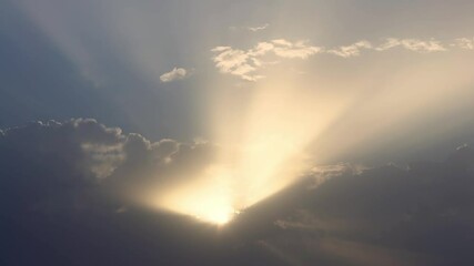 Wall Mural - Beautiful heaven with dramatic light in the evening before sundown light penetrates through the cloud, causing the beam at twilight background. Sunbeam across the haze-Dan