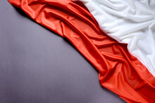 Polish Flag On A Gray Background, Copy Space. Independence Day November 11, Poland.