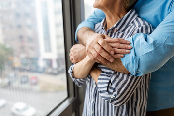 Wall Mural - Portrait of happy senior couple in love spending time together at home