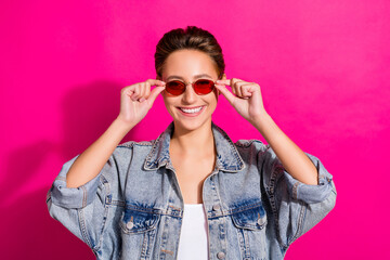 Wall Mural - Photo of young happy positive cheerful woman smile good mood wear sunglass isolated on pink color background