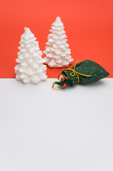 Poster - decorative Xmas wax fir trees on a white red background with space for text