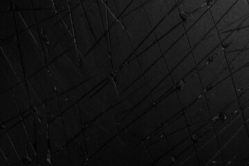 Wall Mural - Old damaged black paper with scratches