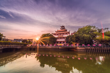 Twilight view of Phap Hoa Pagoda, Ho Chi Minh city, Vietnam. The ancient temple in Southeast Asia. on the vesak festival 2021.