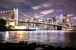 Night panorama with the downtown New York City skyline and the Brooklyn Bridge, viewed from Brooklyn Bridge Park