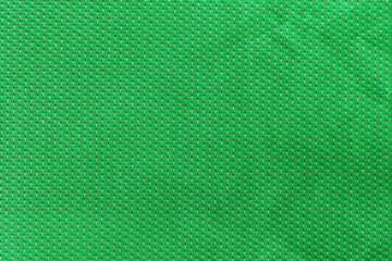 Canvas Print - Green color sports clothing fabric football shirt jersey texture and textile background.