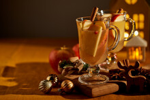 Two Glasses Of Hot Christmas Winter Apple Gluhwein. Alcohol White Mulled Wine With Cinnamon, Cranberry. Apple Cider. Selective Focus, Dark Background With Hard Light Shadows
