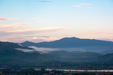 Wall Mural - Landscape with clouds,sky and  mountains of northern Thailand.The mountain splits between Chiang Khong and Chiang Saen districts.