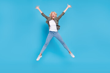 Sticker - Full length body size photo amazed woman jumping up careless happy isolated pastel blue color background