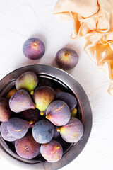 Wall Mural - Portion of fresh Figs on light background