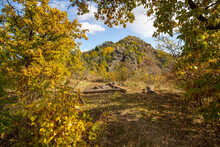 Autumn Landscape With Colorful Trees And Rocky Hill