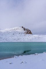 Sticker - A snow-capped mountain and glacial lake in Dagu Glacier National Park, China