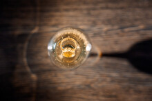 Close Up Of A Drop Of Water In A Glass, Wedding Rings In A Glass