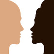 © platonovasvetach - Silhouettes of a dark-skinned girl and a light-skinned guy on a white background.