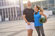 © Kostiantyn - Happy mature couple, man and woman in sportswear posing together after morning workout
