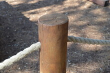 Wooden Pole With Threaded Rope