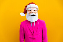 Man With Funny Low Poly Santa Claus Mask On Colored Background