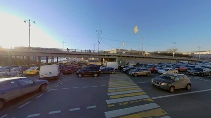 Wall Mural - Traffic at a busy intersection captured by a 360-degree camera, time lapse, hyperlapse