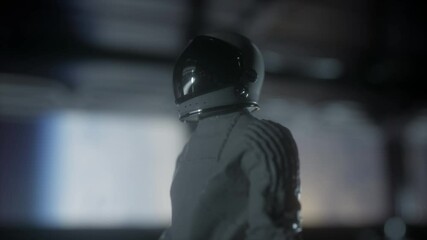 Wall Mural - astronaut going through the tunnel to another compartment of futuristic spaceship