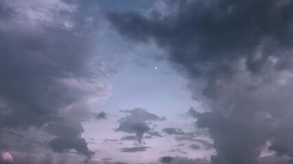 Wall Mural - a time-lapse of dark cloudy sky and wind