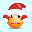 © Olha Bodanina - New year sad emoji holding red santa hat.