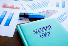 Business Concept About SECURED LOAN With Inscription On The Book
