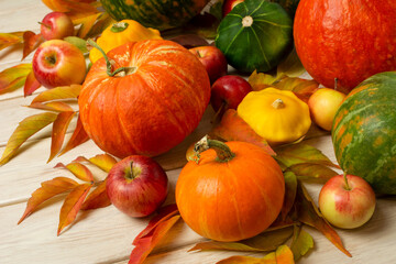  Fall holiday decor with red, green, orange pumpkins