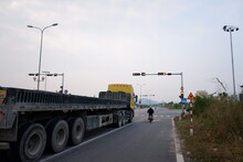 Long Black Yellow Truck Stopped At A Traffic Light On 26/10/2021 In Thanh Hoa City, Thanh Hoa Province, Vietnam.